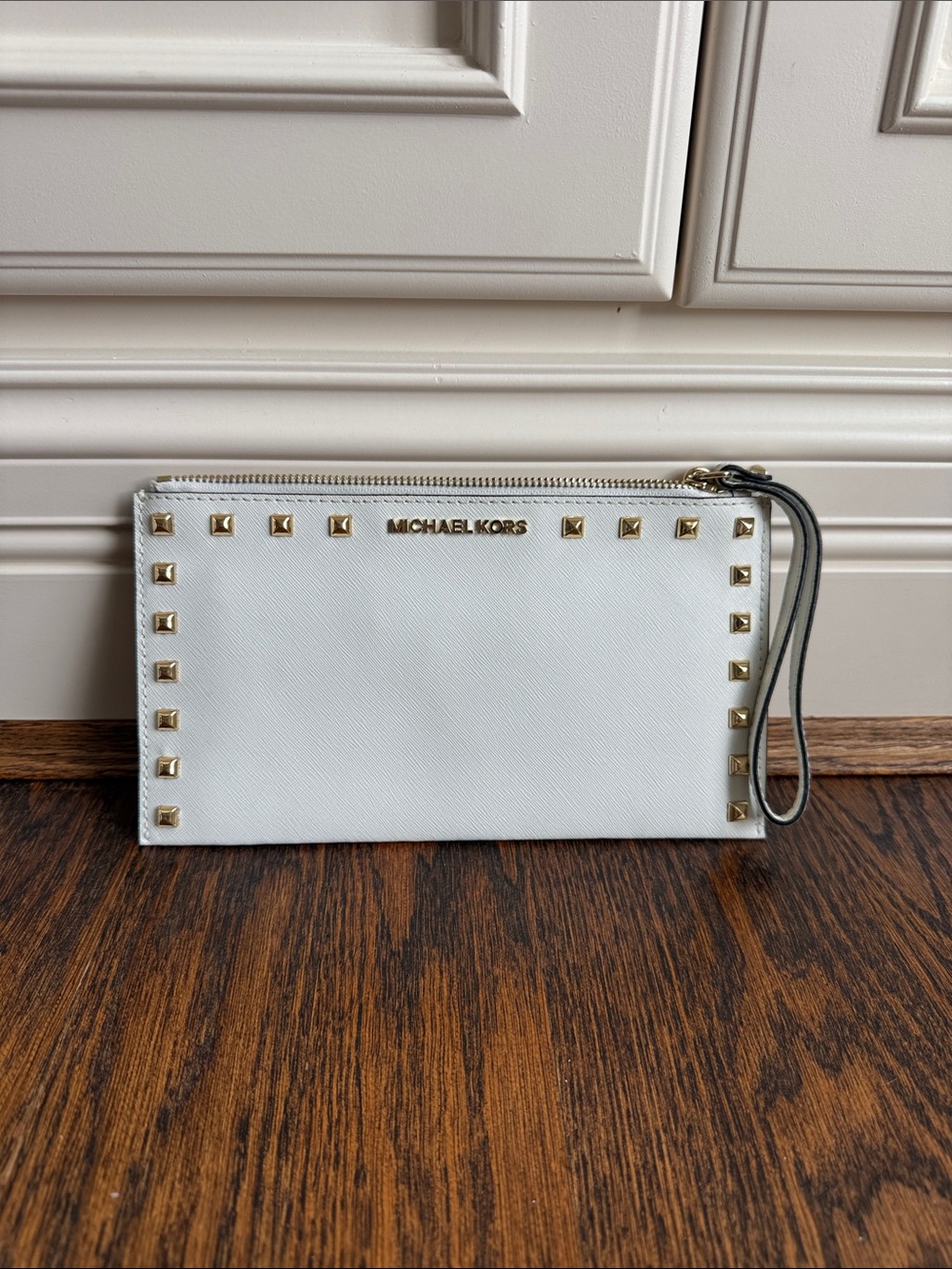 Michael Kors White Wristlet with Gold Studs